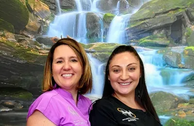 Chiropractor Kansas City MO Nichole Findell With Team Member